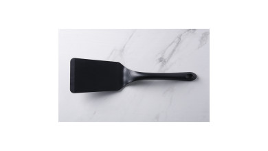 Spatule coudée Exoglass  pour anti-adhésif - La spatule coudée
